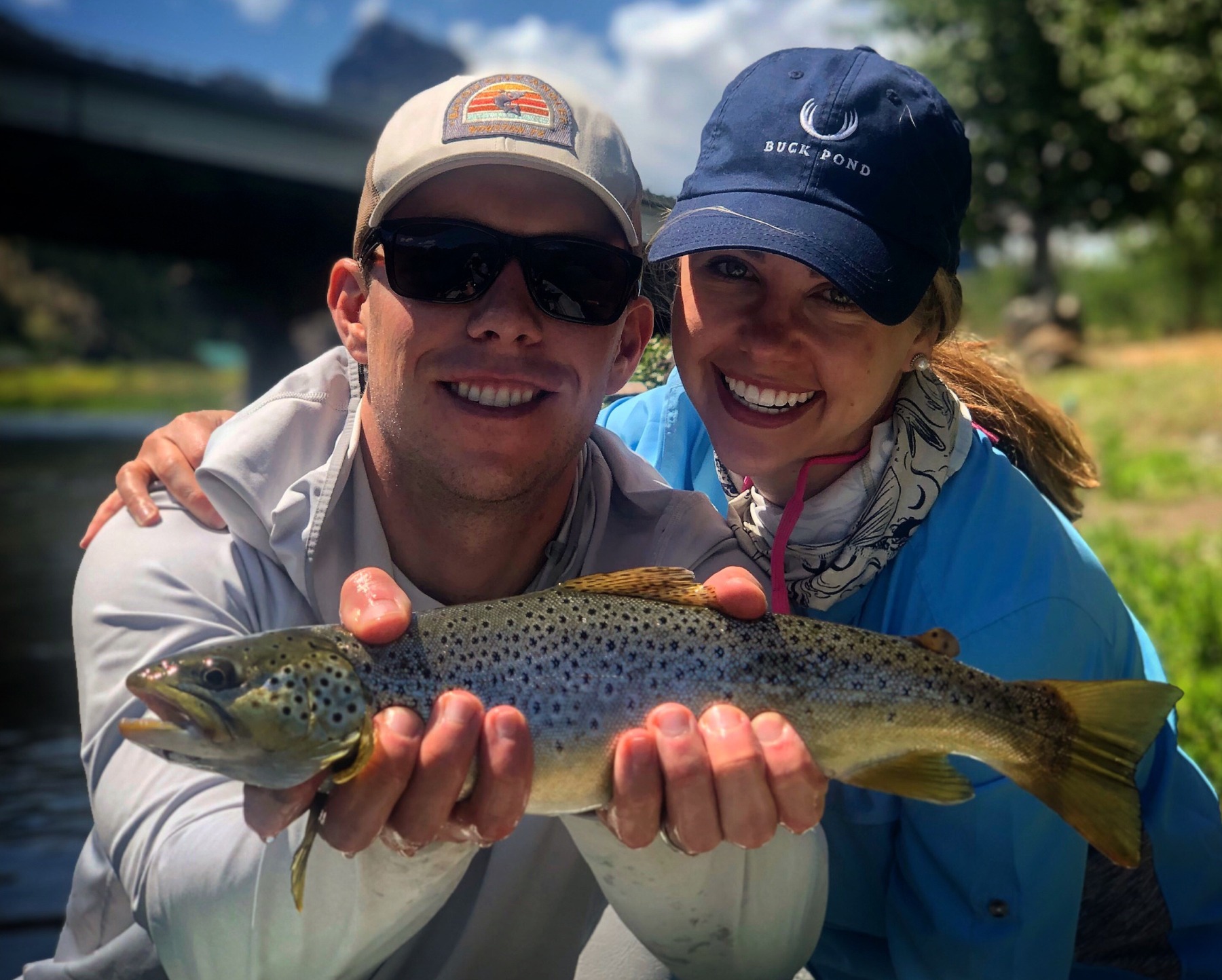 Luke & Anna holding a fish with two hands Missouri River